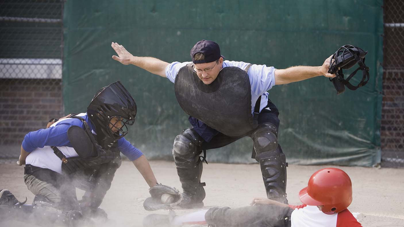 A baseball umpire calling out