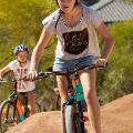 A girl on a bike on the pump track